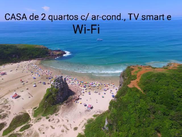 Casa De 2 Quartos Com 2 Ares-Condicionados Em Torres-Rs - Na Mais Bela Praia Gaucha - Cozinha - Banheiro - Tv Smart 32 E Wi-Fi - Estacionamento - Anfitria Superhost No Bnb Villa Kültér fotó